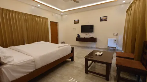 Deluxe room seating and storage area